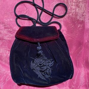 Velvet mini purse colors of purple red and blue used once great condition